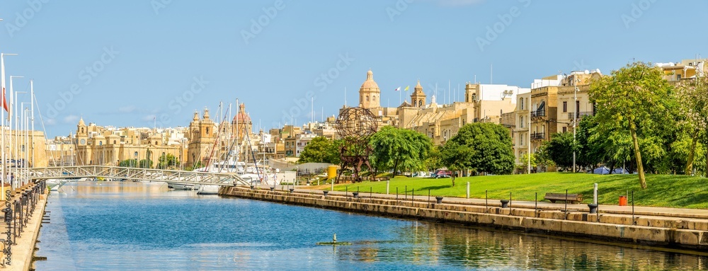 Panoramic view at the Sea canal with harbour in the background in Cospicua - Malta