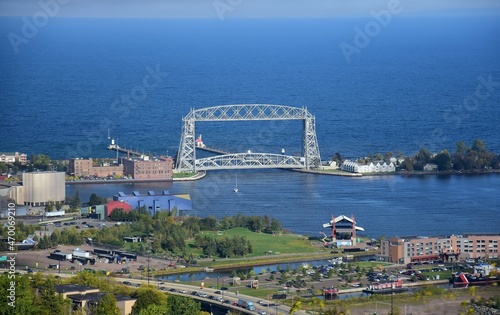 view from enger park of the aerial lift bridge from lake superior into duluth harbor across minnesota point on a sunny fall day in duluth, minnesota 