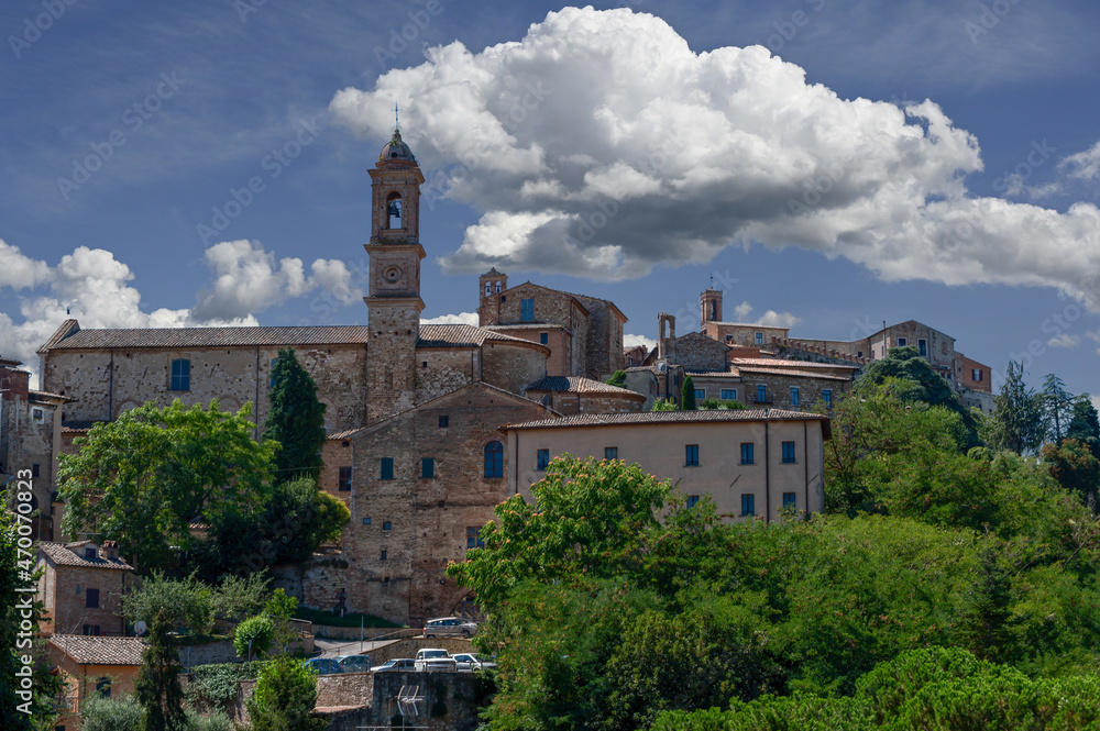 Montepulciano, Tuscany, Italy. August 2020. View of the historic center, recognizable the bell tower of the church of Sant'Agostino. Beautiful summer day.