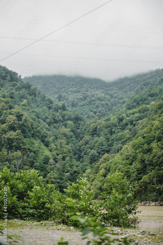Beautiful views of Georgia with dense saturated nature and landscape - an attractive route for tourists Beautiful views of Georgia with dense saturated nature and landscape - an attractive route for tourists