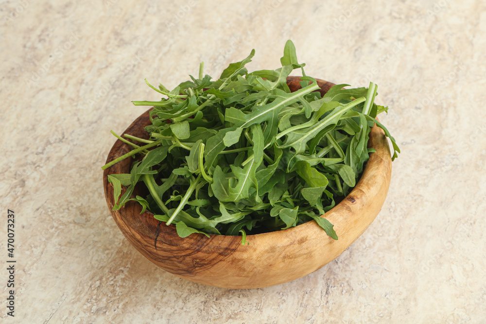 Fresh green arugula in the bowl Fresh green arugula in the bowl