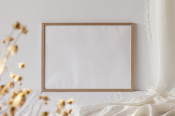 Wooden frame mockup on white wall
