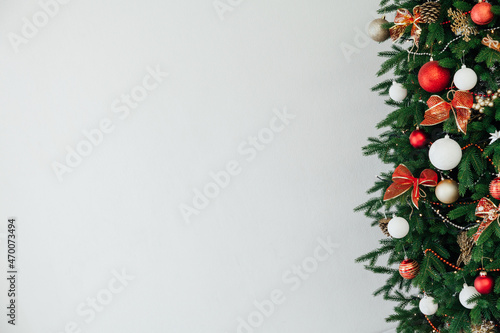 decorated with garland lights Christmas tree year decoration as a background photo