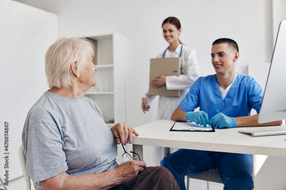 elderly woman communication with a doctor checkup elderly woman communication with a doctor checkup