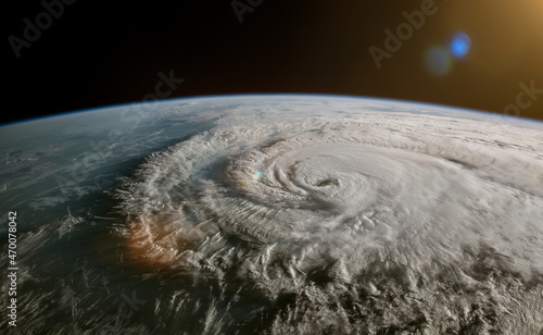 Satellite image of a tropical storm - hurricane or cyclone or typhoon. Climate change concept. Elements of this image furnished by NASA. photo