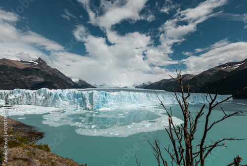 Ice chunks from the edge of Perito Moreno Glacier are calving into the lake