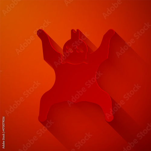 Paper cut Bear skin icon isolated on red background. Paper art style. Vector