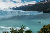 Tour boat floating in Lago Argentino in front of Perito Moreno Glacier, Argentina