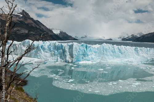 Ice chunks from the edge of Perito Moreno Glacier are calving into the lake