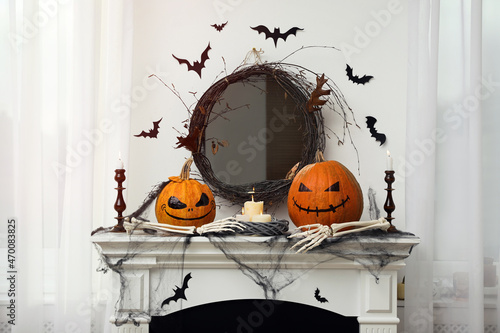 Obraz na płótnie Different Halloween decor on mantelpiece indoors