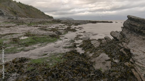 Wallpaper Mural British beach timelapse in Somerset with rocks and seaweed Torontodigital.ca