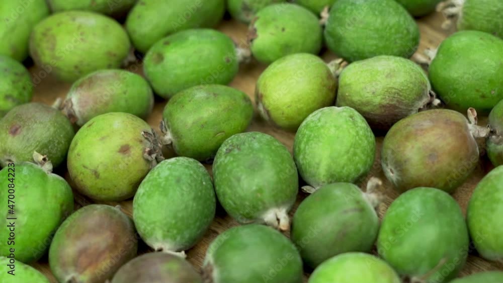 Feijoa, Fruit, Ripe Green Feijoa Spin. Vegan Food. Healthy Vitamin Food. Background from Feijoa. Feijoa, Fruit, Ripe Green Feijoa Spin. Vegan Food. Healthy Vitamin Food. Background from Feijoa.