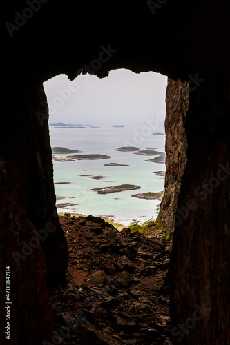 Natural cave with a view at the archipelago in Norway