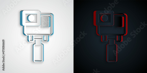 Paper cut Action extreme camera icon isolated on grey and black background. Video camera equipment for filming extreme sports. Paper art style. Vector