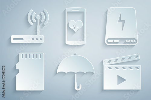 Set Umbrella, Power bank, Micro SD memory card, Movie clapper, Smartphone with heart rate and Router and wi-fi icon. Vector