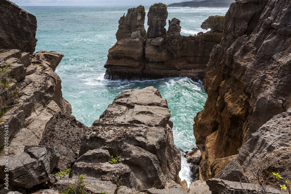 Coastal cliffs of Pancake Rocks near Punakaiki in New Zealand