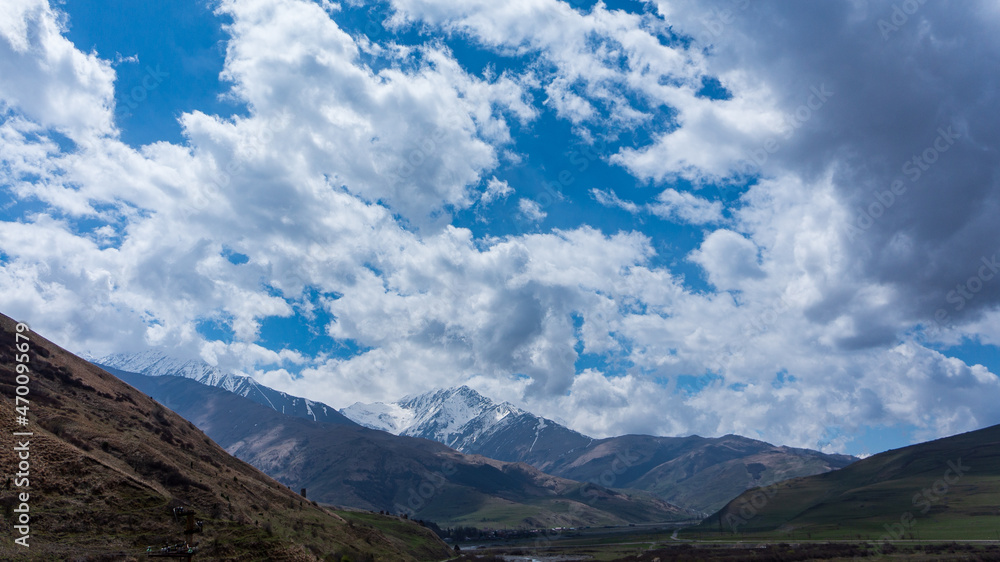Fototapeta premium clouds over the mountains