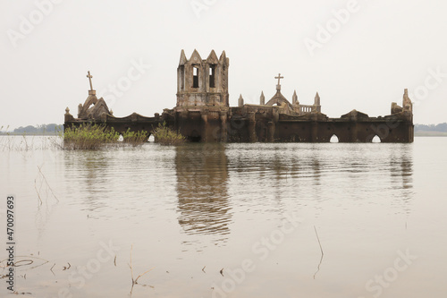 The Rosary Catholic church built by the French in 1860s in Shetti halli is seen submerged in the Hemavati river and is a tourist hotspot during Monsoon in Hassan, India.
 photo