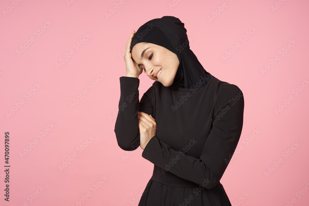 cheerful muslim woman black hijab posing hand gesture pink background cheerful muslim woman black hijab posing hand gesture pink background