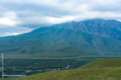 landscape with mountains and clouds