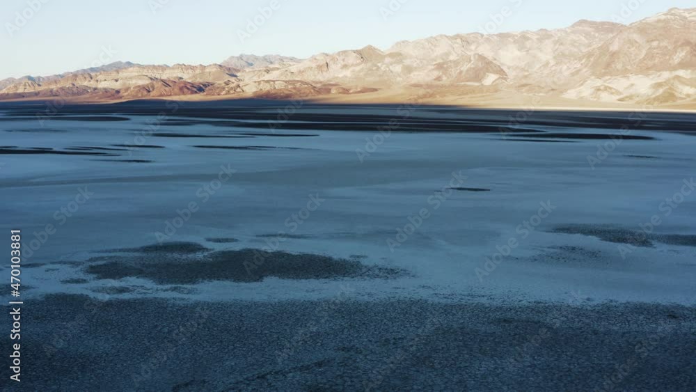 Drone flying low and moving right to left over a rugged and harsh terrain at Devils golf course in Death valley National Park, California. Drone flying low and moving right to left over a rugged and harsh terrain at Devils golf course in Death valley National Park, California.