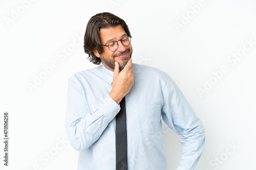 Senior dutch business man isolated on white background looking to the side