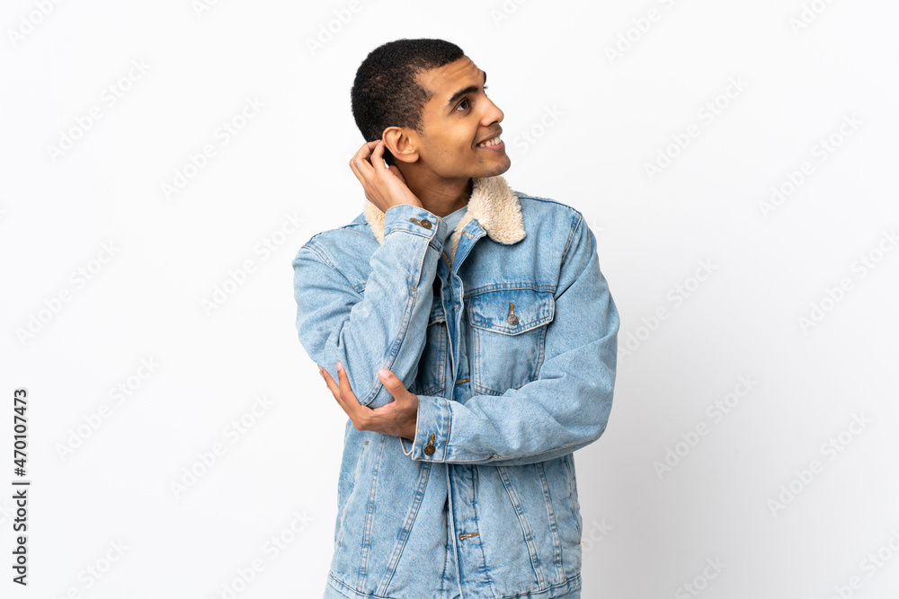 African American man over isolated white background thinking an idea African American man over isolated white background thinking an idea