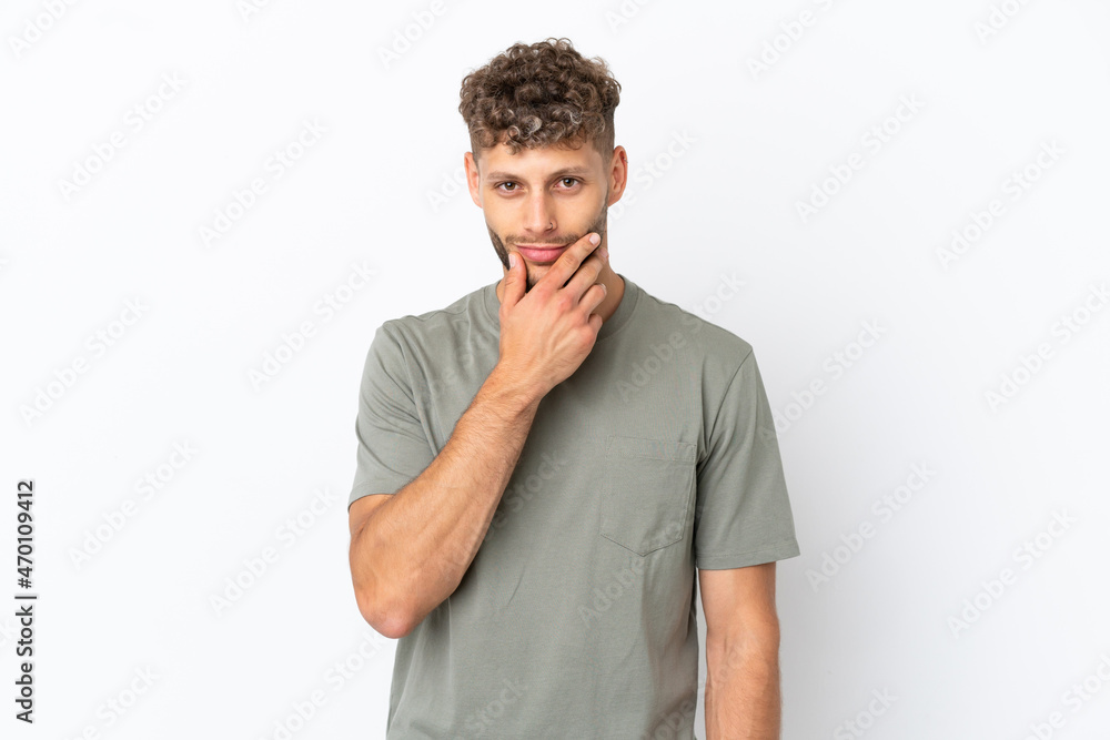 Young caucasian handsome man isolated on white background thinking Young caucasian handsome man isolated on white background thinking