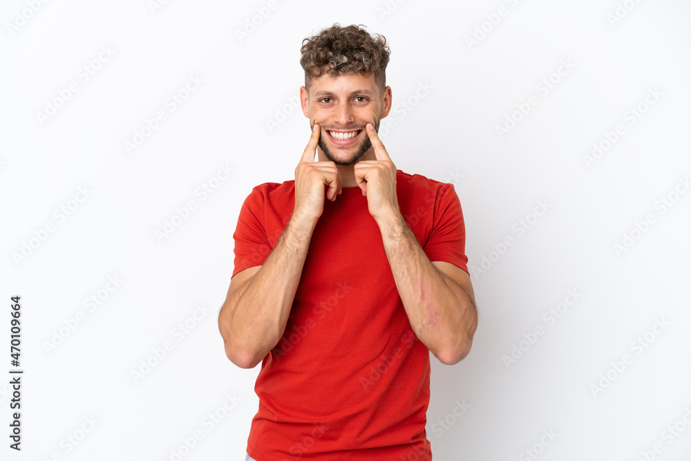 Young caucasian handsome man isolated on white background smiling with a happy and pleasant expression Young caucasian handsome man isolated on white background smiling with a happy and pleasant expression