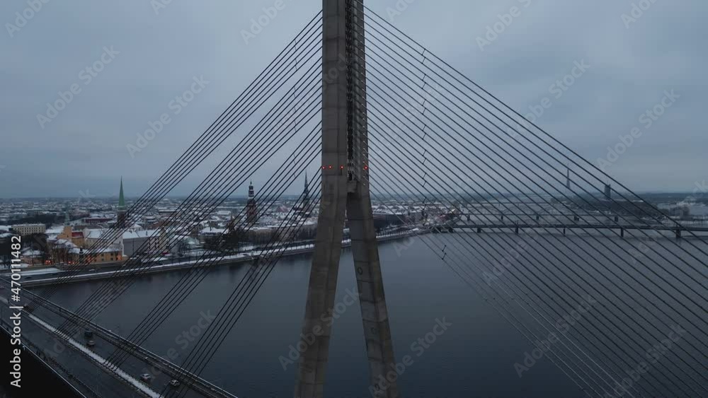 Aerial revealing shot of vansu bridge with car traffic during winter Aerial revealing shot of vansu bridge with car traffic during winter