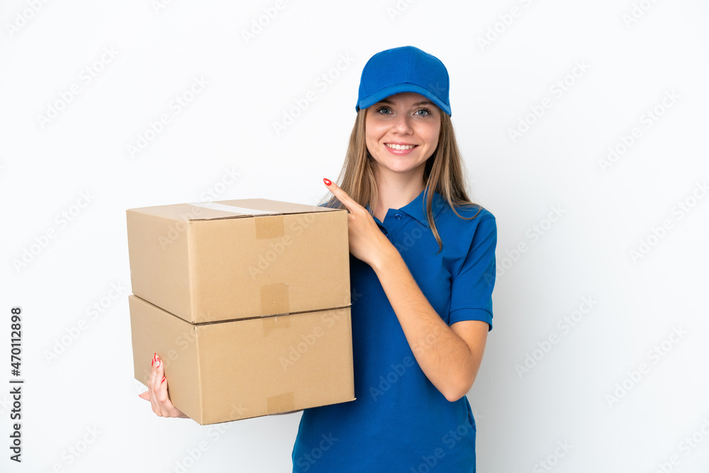 Delivery Lithuanian woman isolated on white background pointing to the side to present a product Delivery Lithuanian woman isolated on white background pointing to the side to present a product