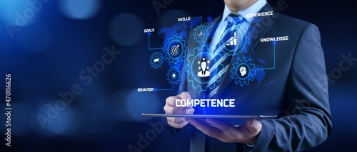 Competence skills business and personal development concept. Businessman pressing button on screen.