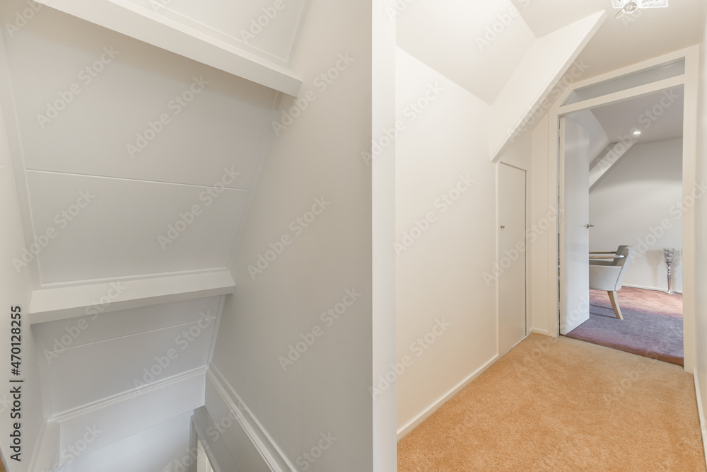 Room near hallway with white walls Room near hallway with white walls