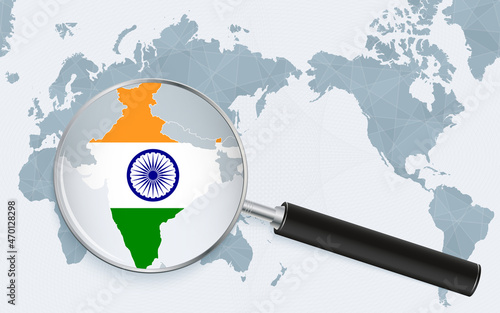 Asia centered world map with magnified glass on India. Focus on map of India on Pacific-centric World Map.