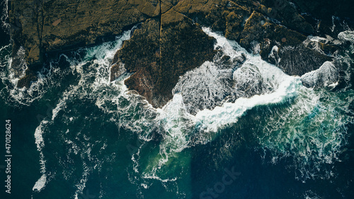 Big waves breaking over rocks