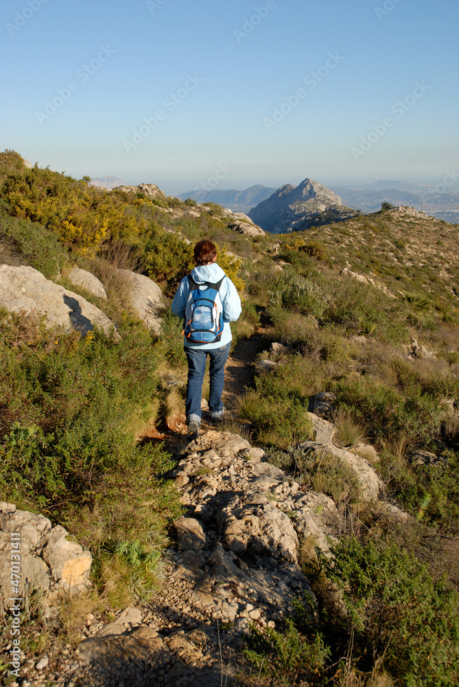 Hiker on Cavall Verd, Vall de Laguar, Alicante Province, Spain