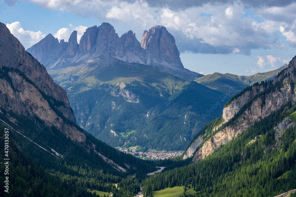 View of the Val Contrin valley with Sassolungo and Canazei in the background. Dolomites. South Tyrol. Italy.