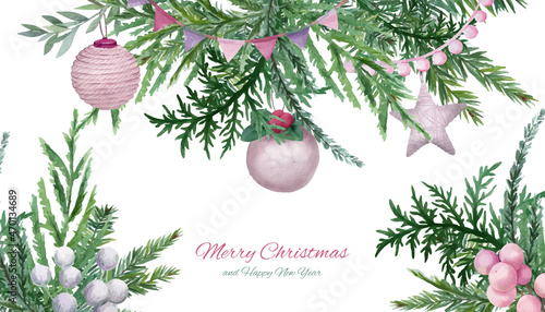 Spruce branches with christmas toys and garlands.