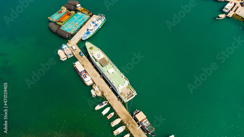 Greek fishing boats on turquoise sea water in Posidonio bay, Samos island, Greece