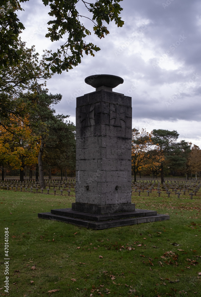 Lommel, Belgium - October 31, 2021: The largest German War Cemetery (Kriegsgraberstatte) and memorial site in Western Europe. Limburg Province. Autumn cloudy day. Selective focus.