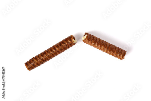 Brown wafer roll isolated on white background. Broken Chocolate wafer roll stick. Close up. Top view