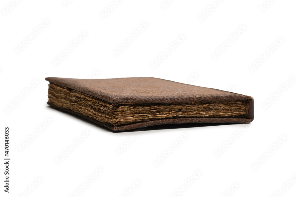 An old brown book isolated on white background. An old brown book isolated on white background.
