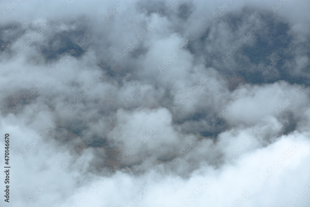 Fototapeta premium mountain, clouds, landscape, cloud, sky, nature, mountains, fog, snow, view, travel, hill, peak, rock, mist, forest, high, skies, water, green, summer, weather, alps, tree, volcano