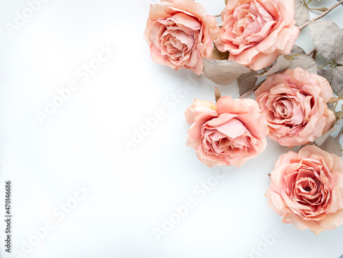 Flowers composition. Bouquet of pink roses in pastel colors. Flatlay.
