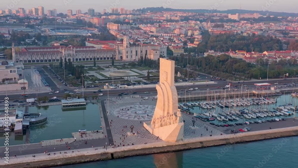 Wonderful sunset landscape overlooking the Portuguese Monument to Discoveries, Padrao dos Descobrimentos. Belem. Jeronimos Castle in background.