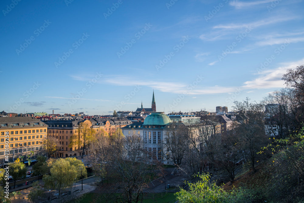 Panorama view over the district Norrmalm from the hill Observatorielunden, roofs of old apartment buildings and the church Engelbrektskyrkan an sunny autumn day in Stockholm