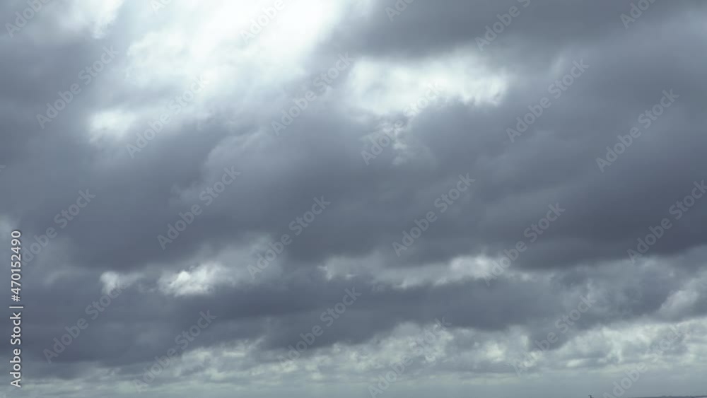 Dark storm clouds make the sky in black. The rain is coming soon. Beautiful heaven with dramatic light, sometimes heavy clouds mass charged. Abstract nature background.-Dan Dark storm clouds make the sky in black. The rain is coming soon. Beautiful heaven with dramatic light, sometimes heavy clouds mass charged. Abstract nature background.-Dan