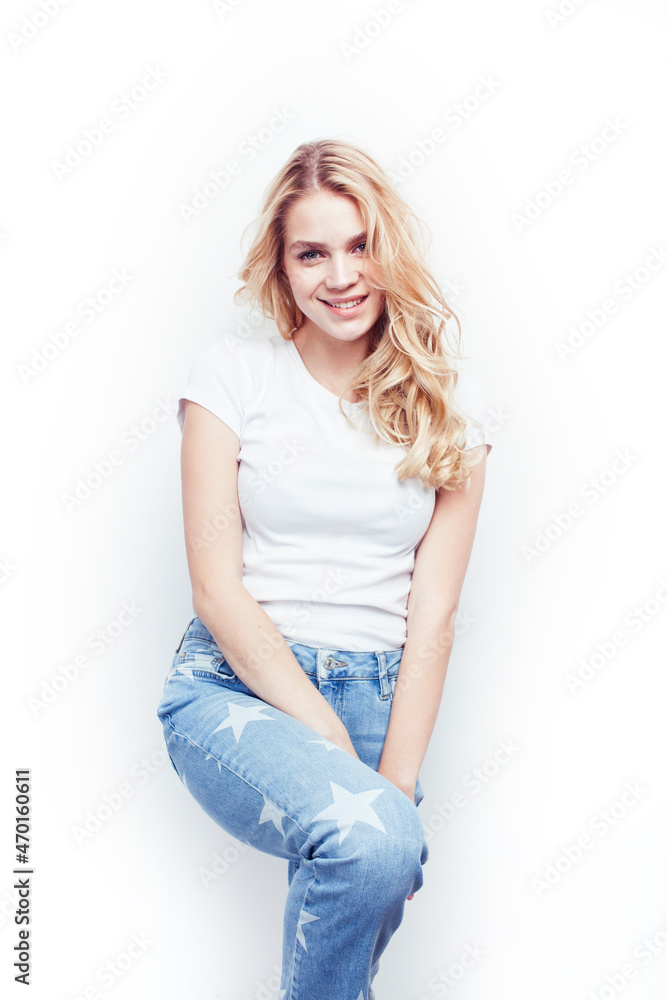young pretty stylish blond hipster girl posing emotional isolated on white background happy smiling cool smile, lifestyle people concept young pretty stylish blond hipster girl posing emotional isolated on white background happy smiling cool smile, lifestyle people concept