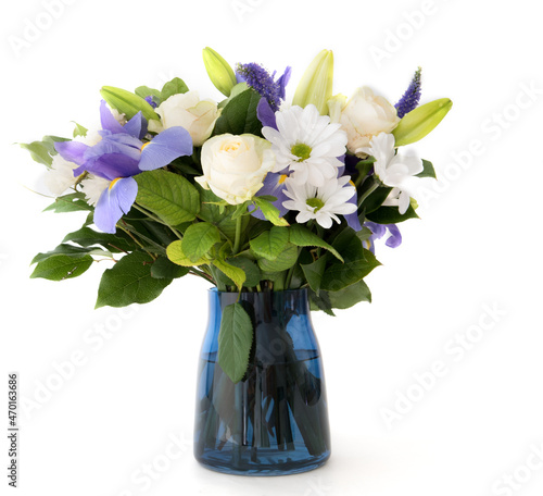 Funeral Bouquet purple White flowers, Sympathy and Condolence Concept on white background with copy space.
