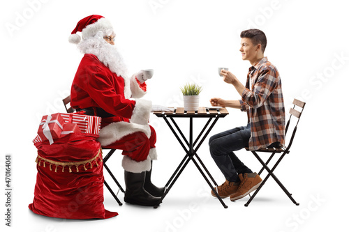 Santa Claus drinking espresso coffee with a young man